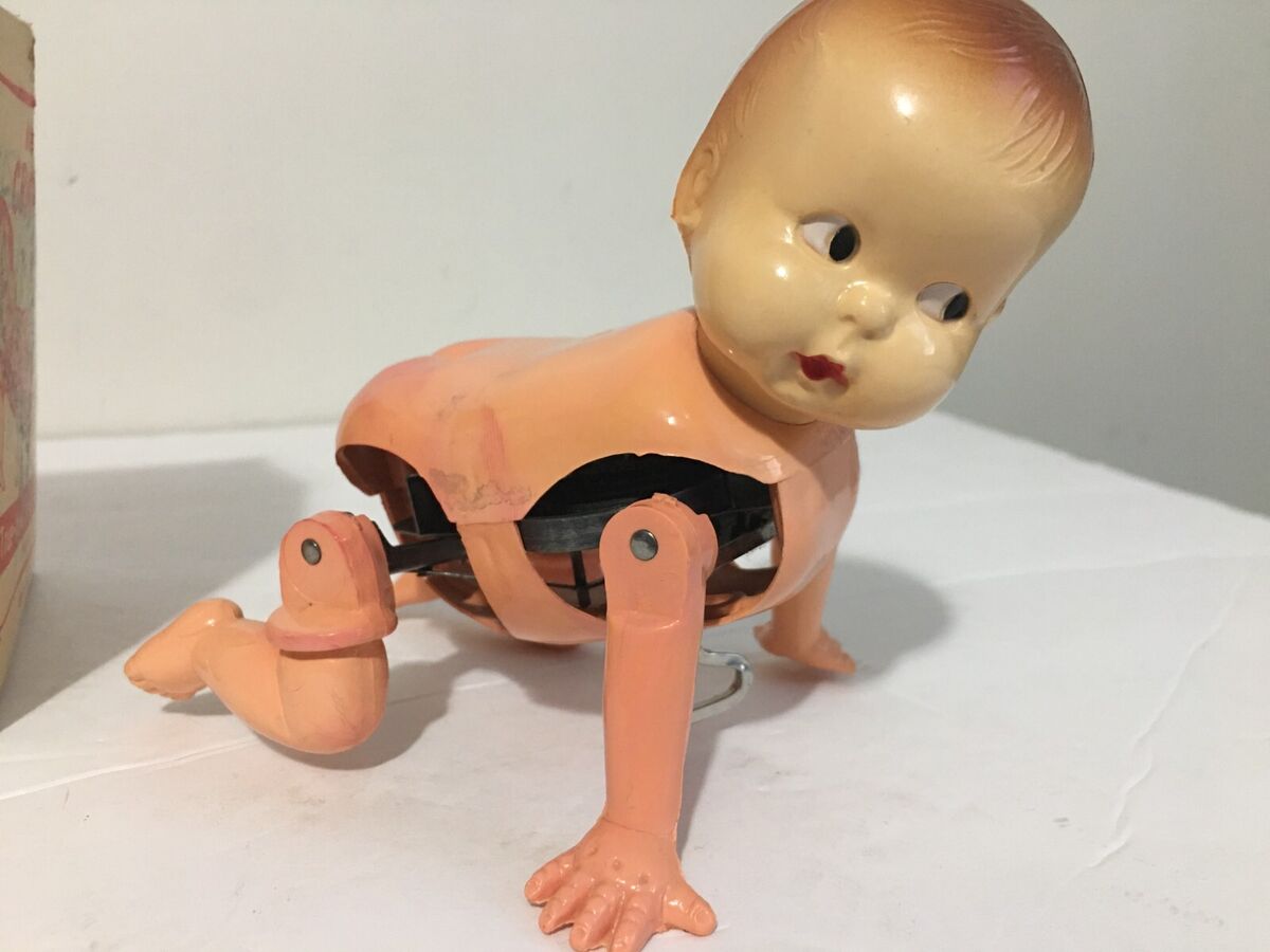 mechanical toy crawling baby in pampers